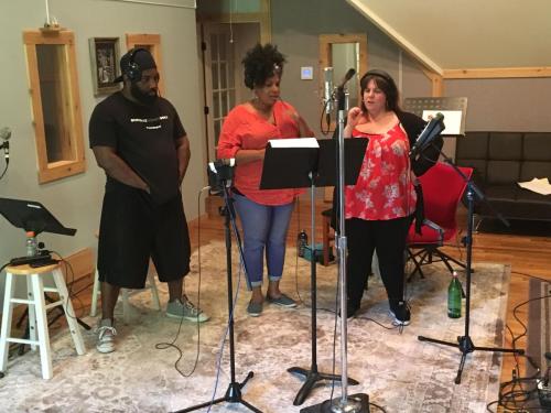 Background vocalists at work